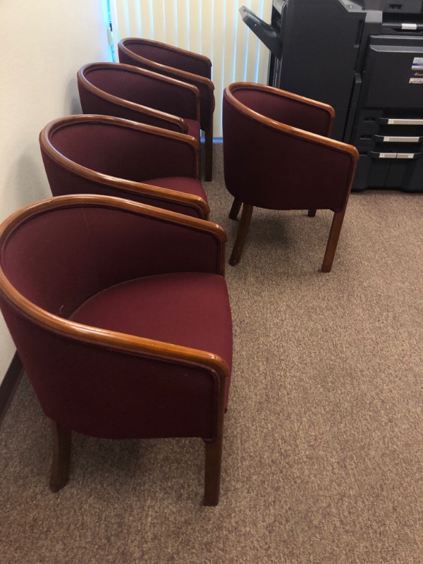 Photo 3 of 5 Red Cushioned Chairs with Wooden Armrests and legs.