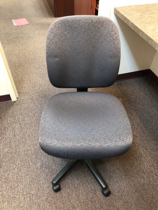 Photo 1 of Cushioned Adjustable Office Chair.