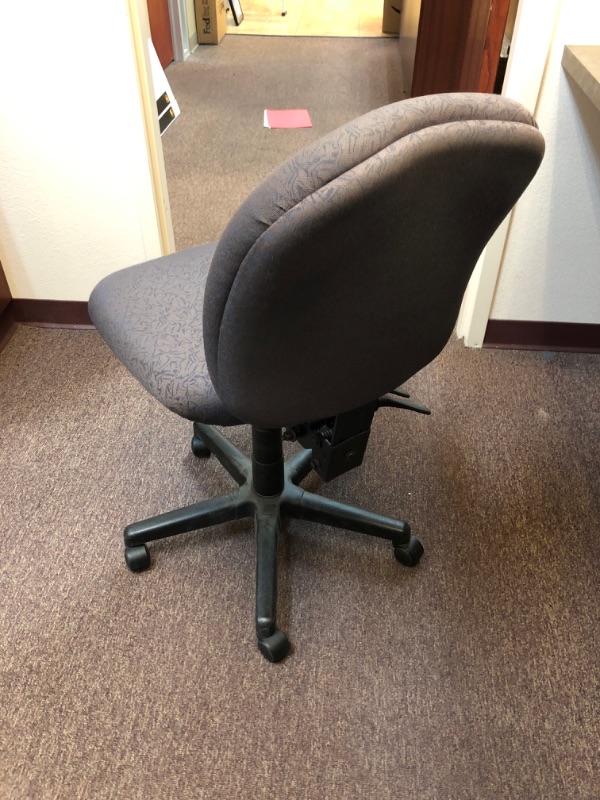 Photo 2 of Cushioned Adjustable Office Chair.