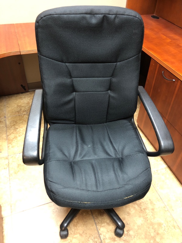 Photo 1 of Black office chair.