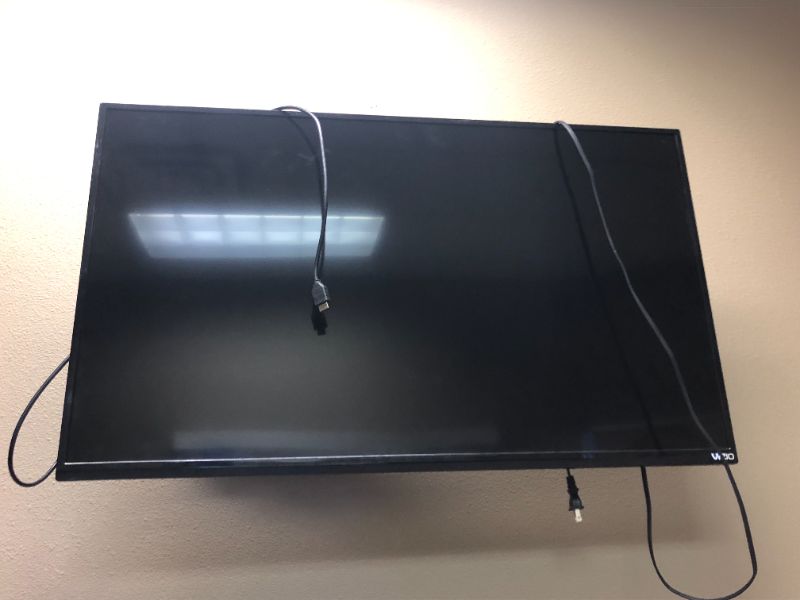 Photo 1 of 42 inch Vizio tv with mount.