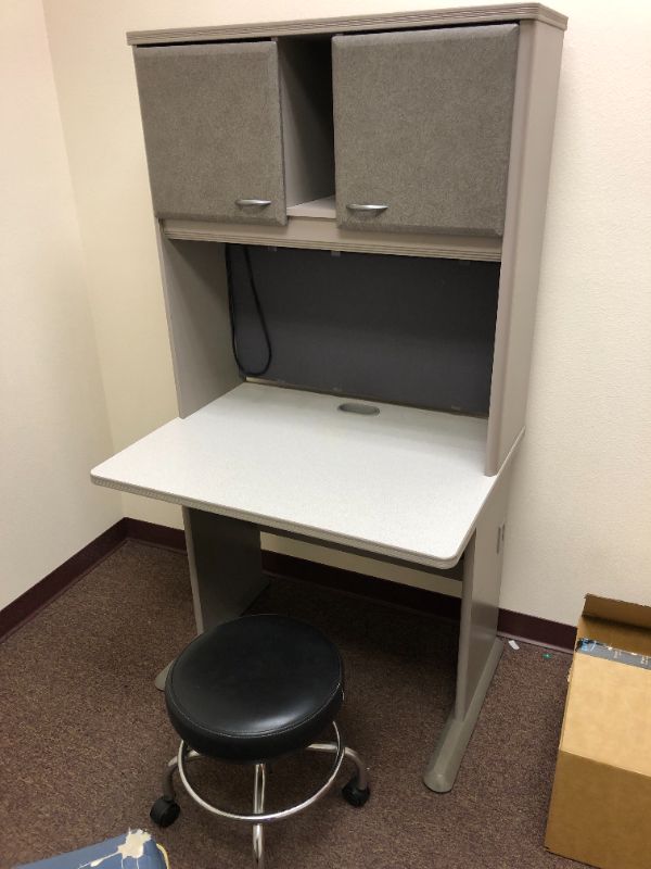 Photo 1 of Work station with black leather chair.
