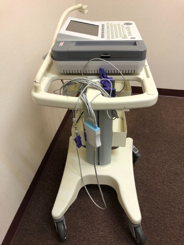 Photo 6 of Cardiotech ekg machine with rolling cart.