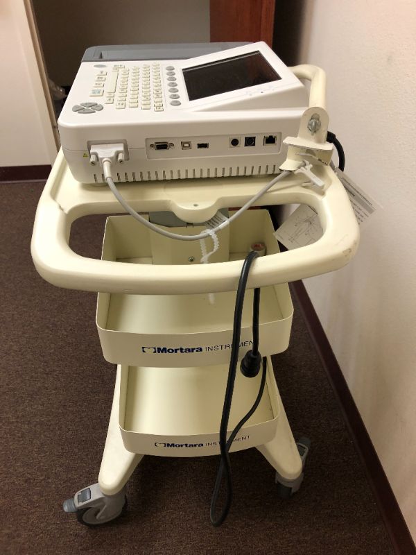 Photo 5 of Cardiotech ekg machine with rolling cart.