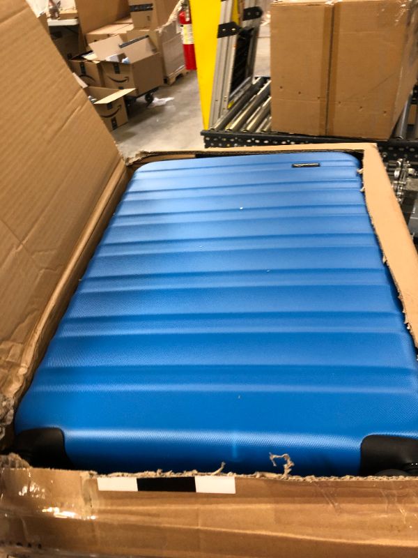 Photo 1 of Amazon Basics 30-Inch Hardside Spinner, Blue
