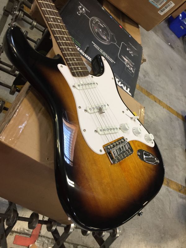 Photo 4 of Squier by Fender Stratocaster Beginner Guitar Pack, Laurel Fingerboard, Brown Sunburst, with Gig Bag, Amp, Strap, Cable, Picks, and Online Lessons
