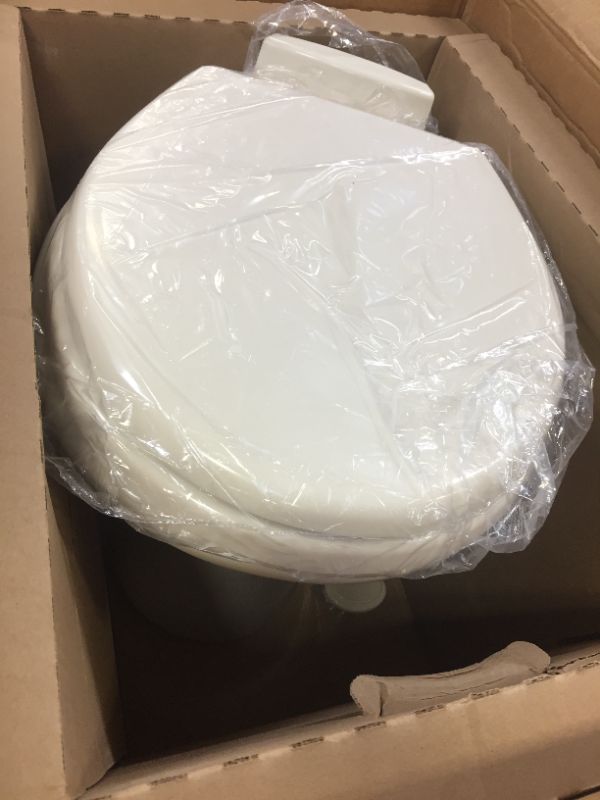 Photo 1 of Dometic 302310083 310 Series Standard Height RV Toilet 18" Height, Slow Close Wood Seat, Bone