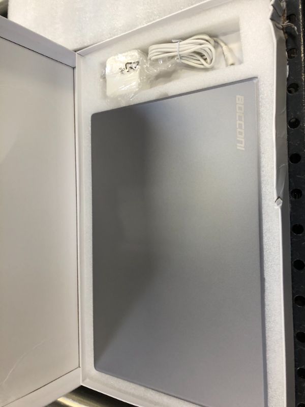 Photo 2 of BOCCONI T6 PRO Ultra-Thin 15.6 inch HD Laptop (LIKE NEW, MAJOR DAMAGES TO BOX)