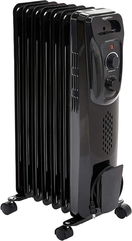 Photo 1 of Amazon Basics Indoor Portable Radiator Heater - Black
