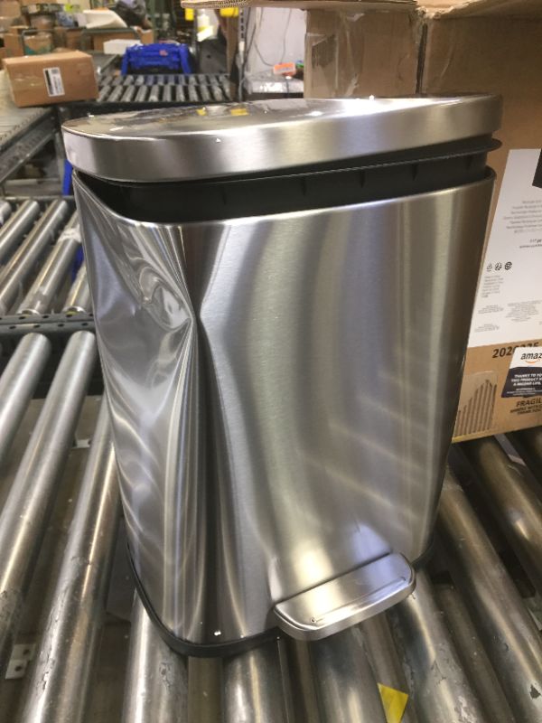 Photo 2 of Amazon Basics 12 Liter / 3.1 Gallon Soft-Close Trash Can with Foot Pedal - Stainless Steel