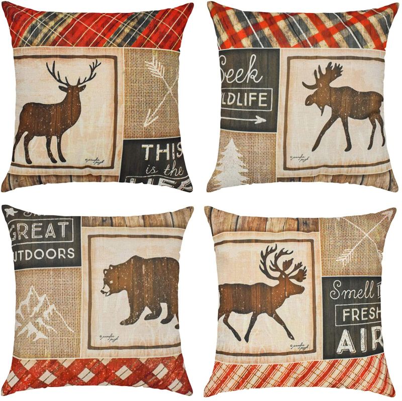 Photo 1 of Brataa 4 Pcs Merry Christmas Elk Throw Pillow Covers Cotton Linen Farmhouse Pillowcases Square Soft Cushion Case for Sofa Couch Home Car Xmas Decor 18 x 18...