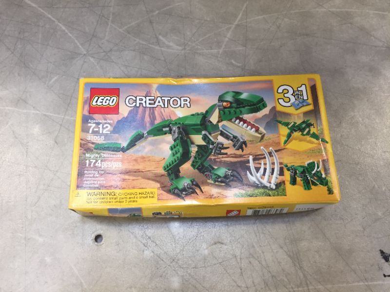 Photo 1 of LEGO Creator Mighty Dinosaurs 31058 Build It Yourself Dinosaur Set, Create a Pterodactyl, Triceratops and T Rex Toy (174 Pieces)
