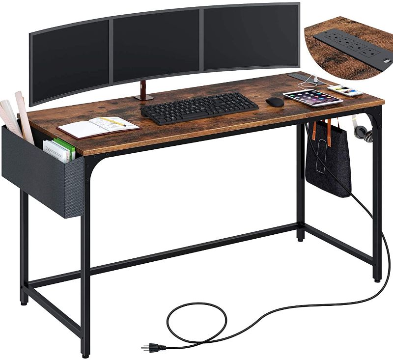 Photo 1 of Rolanstar Computer Desk with Power Outlet, 55” Home Office PC Desk with USB Ports Charging Station, Desktop Table with Side Storage Bag and Iron Hooks, Stable Metal Frame Workstation, Rustic Brown
