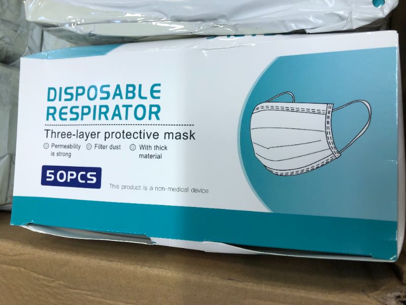 Photo 1 of 25 PACKS OF DISPOSABLE FACEMASK 50 IN EACH BOX 