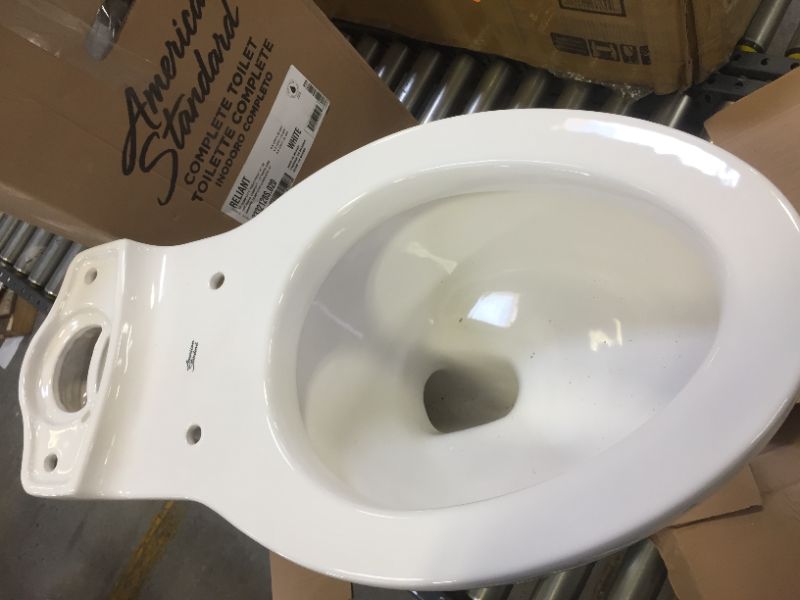 Photo 1 of Champion Tall Height 2-Piece High-Efficiency 1.28 GPF Single Flush Elongated Toilet in White Seat Included