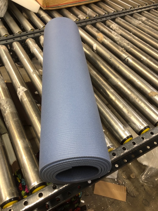Photo 1 of 26INCH WIDE BLUE YOGA MAT.