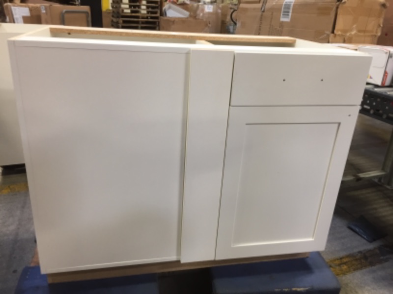 Photo 1 of 42in W X 24.5in D X 34.5in H WHITE CABINET. WITH ONLY ONE DRAWER AND ONE DOOR ON THE RIGHT SIDE