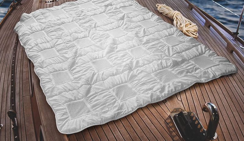 Photo 1 of Clima Balance - Lightweight All Year Down Alternative Comforter King - Breathable Patented Design - Increases Deep Sleep Phases up to 50% - Sensofill Virgin Polyester - King 110" x 96"
