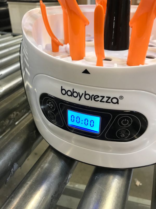 Photo 3 of Baby Brezza Baby Bottle Sterilizer and Dryer Machine – Electric Steam Sterilization - Universal Fit - Pacifiers, Glass, Plastic, and Newborn Feeding Bottles
