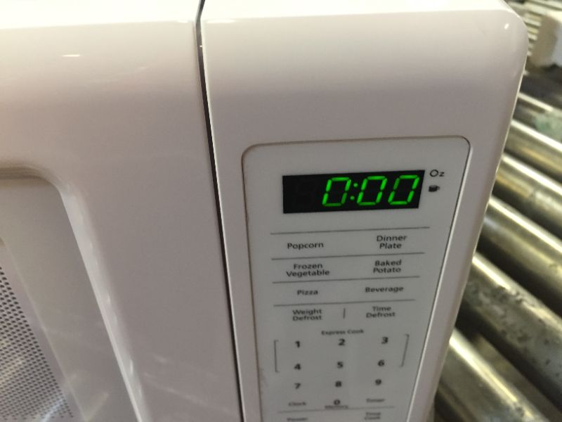 Photo 5 of 0.7 cu. ft. Countertop Microwave in White
