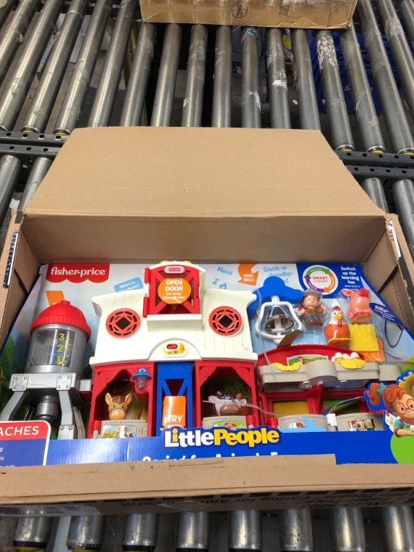 Photo 1 of Fisher-Price Little People Caring for Animals Farm Playset with Smart Stages Learning Content for Toddlers and Preschool Kids
