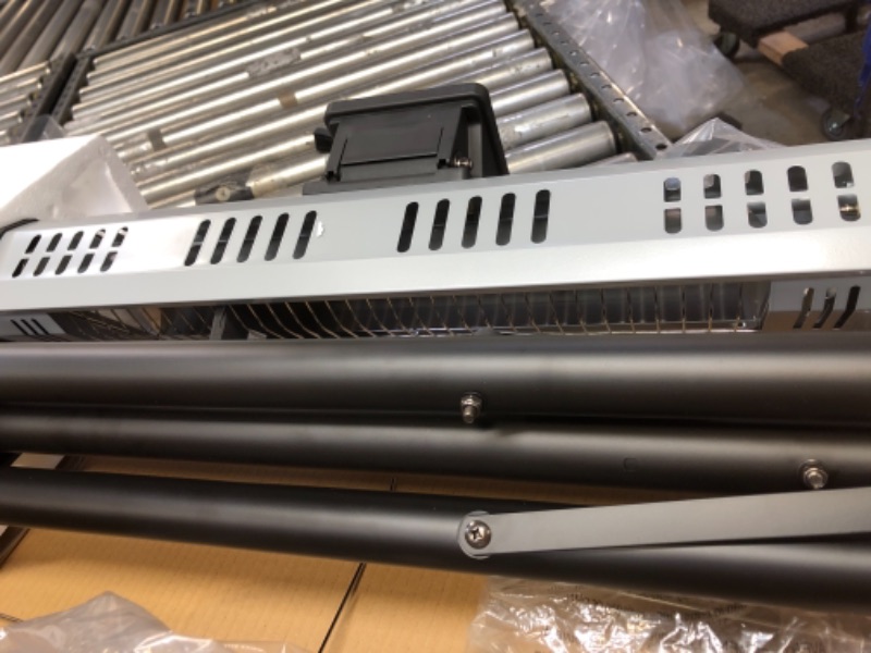 Photo 3 of sold for parts only---They don't turn on---Heat Storm Tradesman 1,500-Watt Electric Outdoor Infrared Quartz Portable Space Heater with Tripod, Wall/Ceiling Mount and Remote, Black

