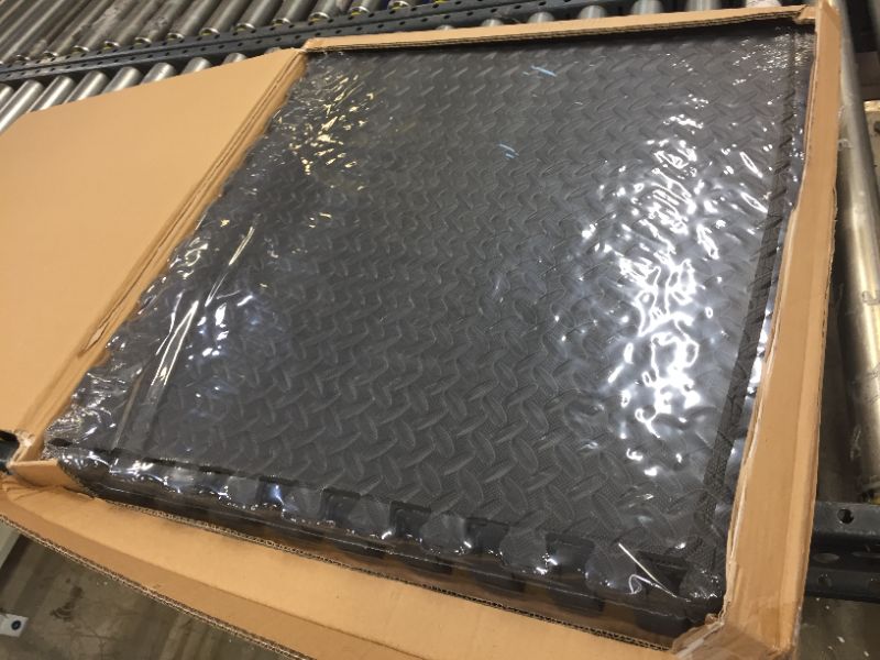 Photo 1 of Amazon Basics Foam Interlocking Exercise Gym Floor Mat Tiles - Pack of 6, 24 x 24 x .5 Inches, Black

