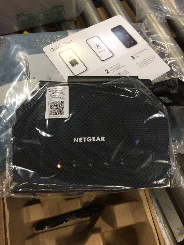 Photo 2 of NETGEAR 4-Stream WiFi 6 Router (R6700AX) – AX1800 Wireless Speed (Up to 1.8 Gbps) | Coverage up to 1,500 sq. ft., 20 devices - NOT IN ITS ORIGINAL PACKAGING 
