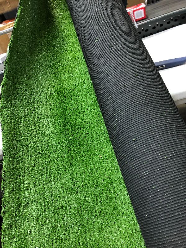 Photo 2 of ARTIFICIAL GRASS RUG 7FT X 12FT