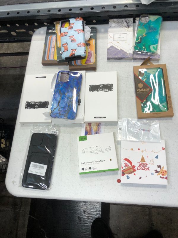 Photo 1 of miscellaneous phone case box lot