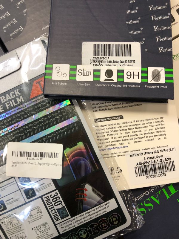 Photo 2 of bundle of screen protectors -- see images for types