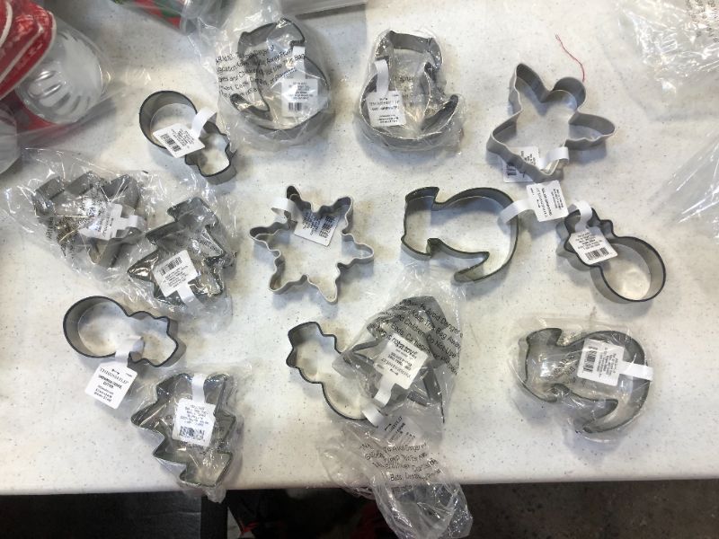 Photo 1 of ASSORTED COOKIE CUTTERS, CAT, DOG, SNOWMAN, PINE TREE, ANGEL, SNOWFLAKE ,  STAR, FROM TARGET