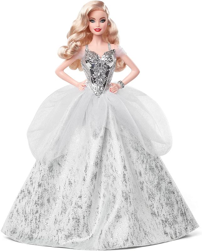 Photo 1 of Barbie Signature 2021 Holiday Doll (12-inch, Blonde Wavy Hair) in Silver Gown, with Doll Stand and Certificate of Authenticity, Gift for 6 Year Olds and Up