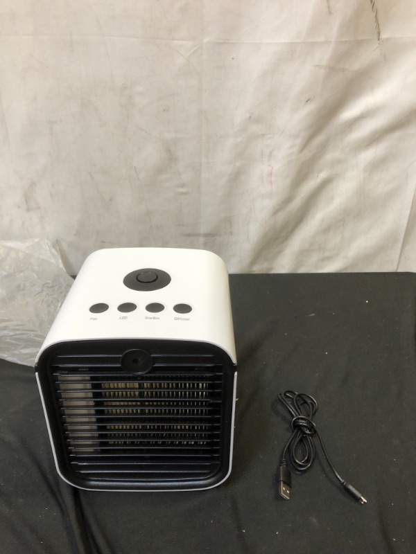 Photo 2 of Ontel Arctic Air Pure Chill Evaporative Ultra Portable Personal Air Cooler with 4-Speed Air Vent, As Seen on TV
