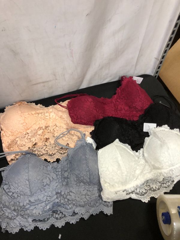 Photo 1 of 5 PACK ASSORTED BRAS 
XL