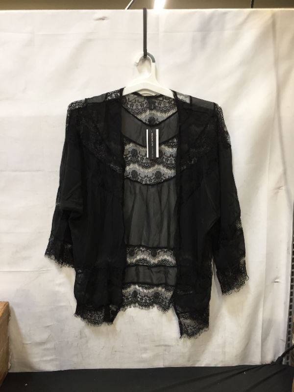 Photo 1 of women's shirt one 4xl and two xl   