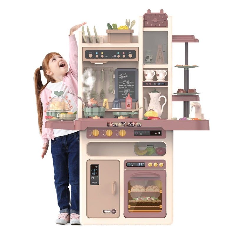 Photo 1 of Deluxe Play Kitchen with Realistic Steam| Electronic Lights | Sizzling Sounds| Classic Music| Tap Water& 65 Pc Kitchen Accessories Set (possibly missing pieces)