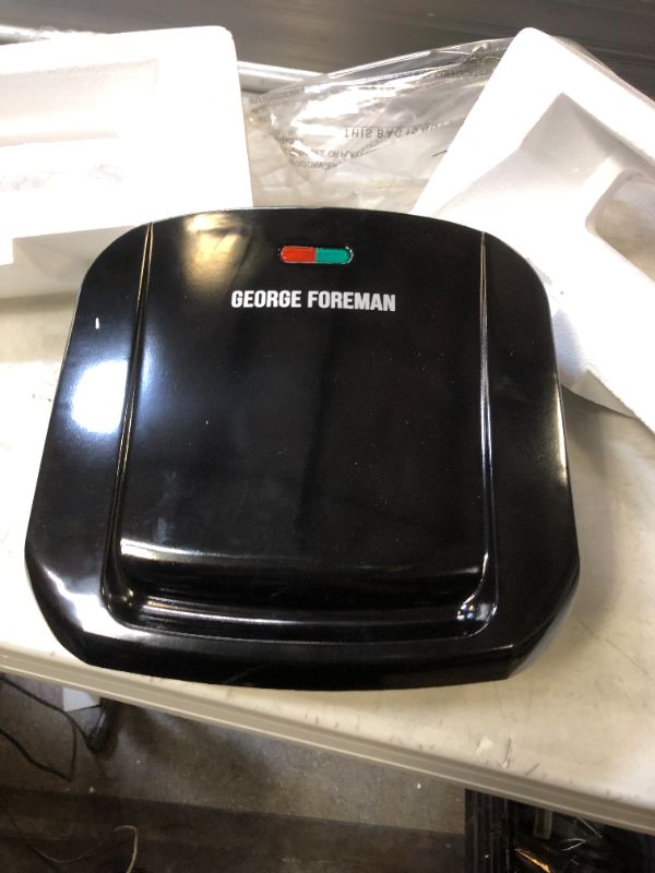 Photo 1 of George Foreman 4-Serving Removable Plate Electric Grill and Panini Press, Black, GRP1060B