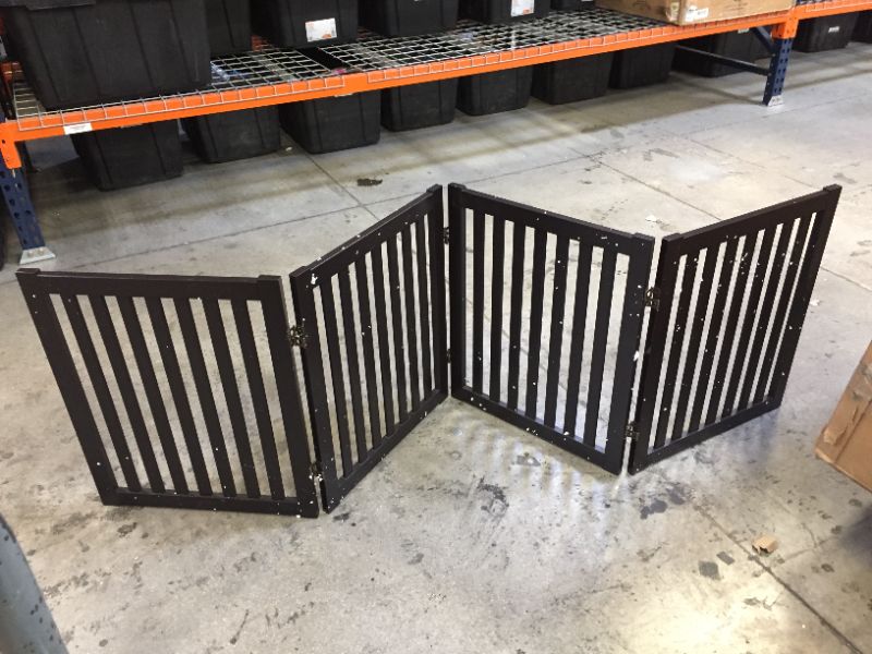 Photo 1 of 23 x 80 inch dark brown pet gate 
