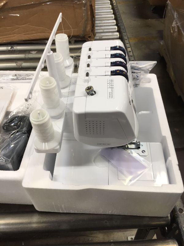 Photo 1 of Brother Serger, DZ1234, Metal Frame Overlock Machine, 1,300 Stitches Per Minute, Removeable Trim Trap, 3 Included Accessory Feet and 2 Sets of Starter Thread
