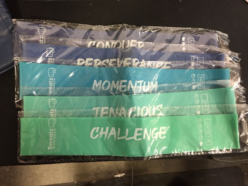 Photo 1 of 4 pack of resistance band packs, 20 bands total