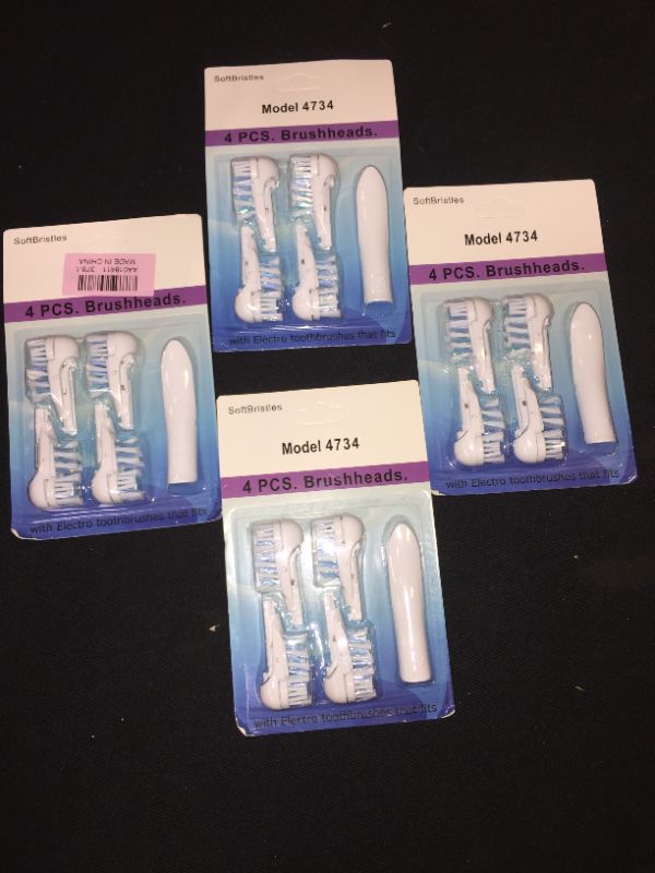 Photo 1 of 4 packs of generic toothbrush replacement heads