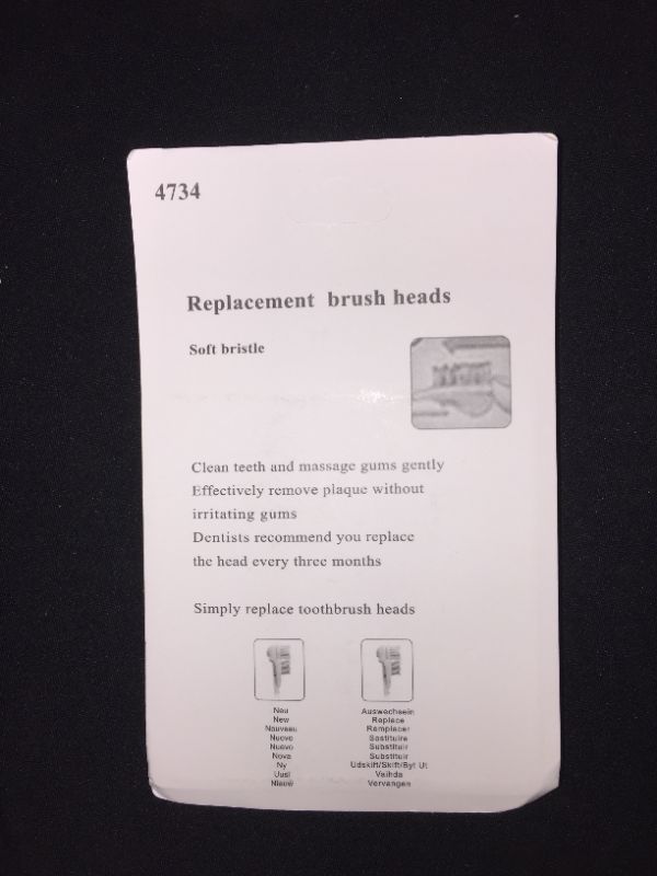 Photo 2 of 4 packs of generic toothbrush replacement heads