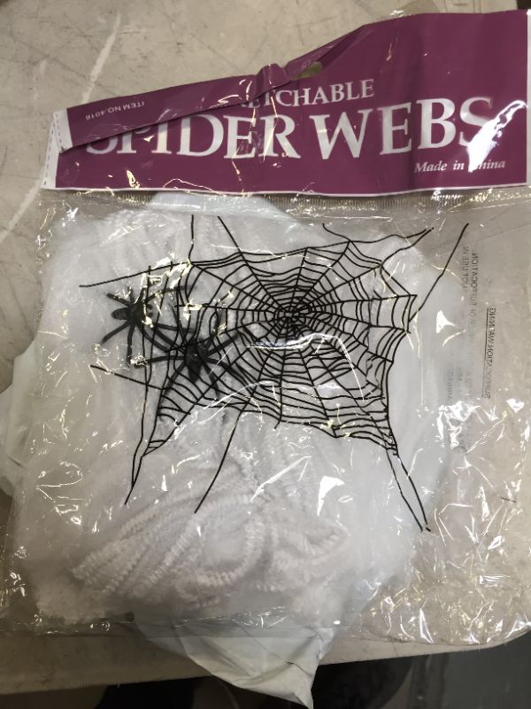 Photo 1 of 11 PACK OF SMALL WHITE STRETCHABLE SPIDER WEBS WITH 1 GIANT SPIDER WEB PACKAGE