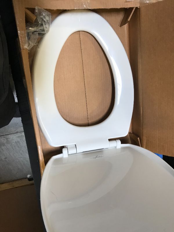 Photo 1 of Caswell Never Loosens Elongated Plastic Toilet Seat with Slow Close Hinge White - Mayfair by Bemis