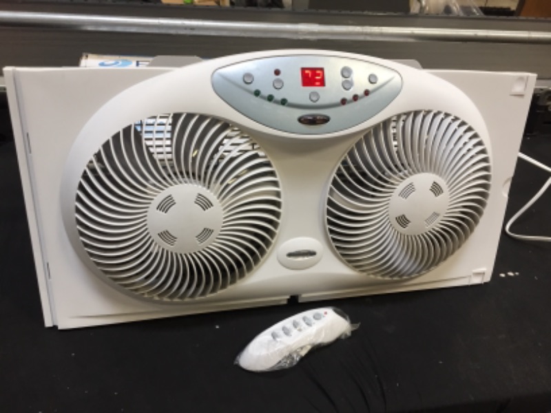 Photo 1 of Bionaire 9 in. Twin Window Fan with Remote Control, White