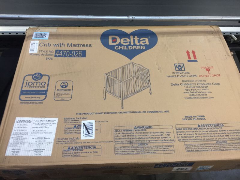 Photo 3 of Delta Children Folding Portable Crib with Mattress Grey