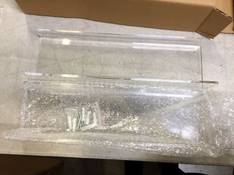 Photo 1 of clear shelfing 