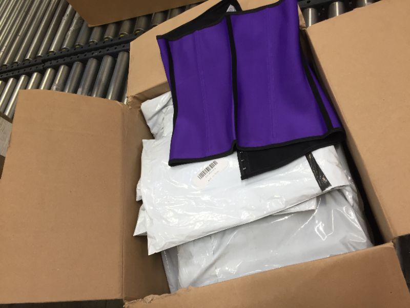 Photo 1 of  Case of Purple waist trainers sized medium 