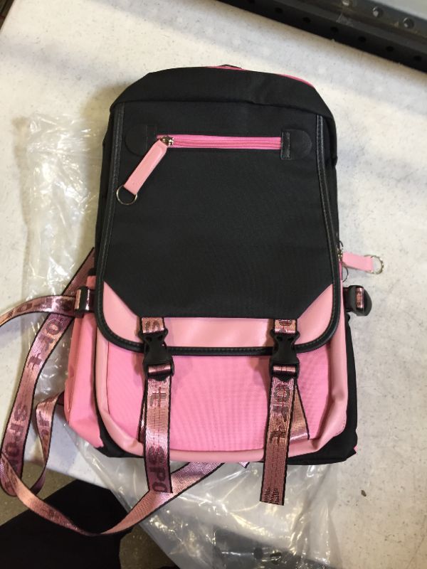 Photo 1 of backpack color pink and black 